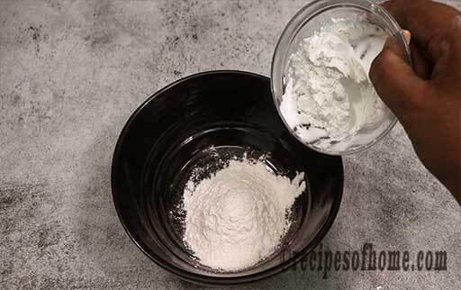 mix maida and cornstarch in a bowl