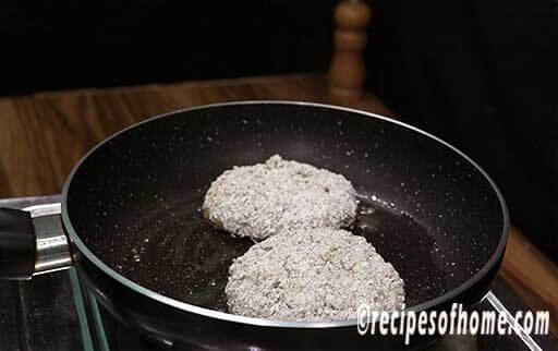 heat oil in a pan and fry veggie patty