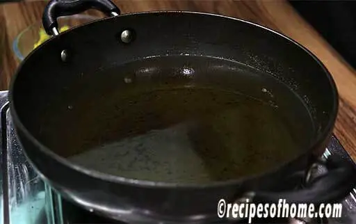 heat oil in a kadai