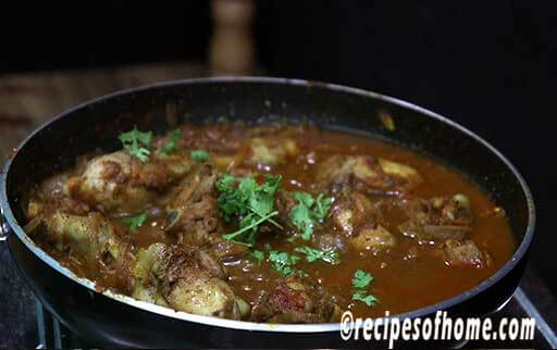 garnish chicken vindaloo curry with freshly chopped coriander leaves