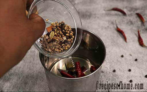 pour roasted whole spices and soaked red chili in a blender