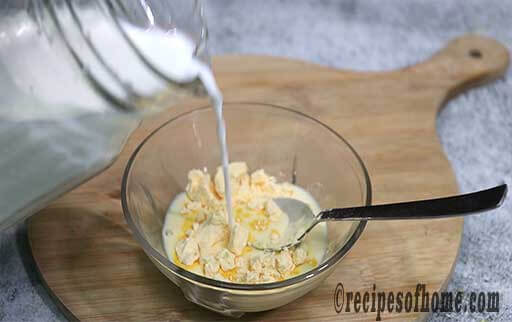 pour warm milk in bowl