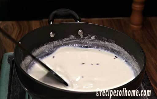 stir milk in low flame