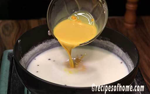 pour custard slurry in kadai