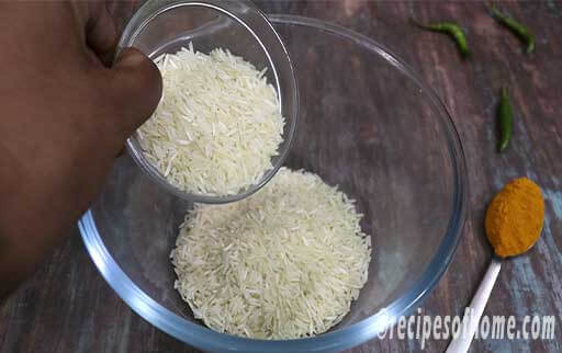 pour long grain basmati rice in a mixing bowl