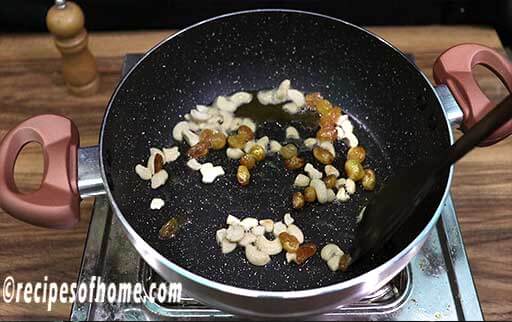 stir cashew nuts and raisins till golden brown
