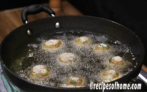 place onion pakora ball on hot oil to fry