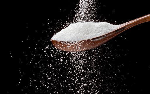 Add sugar to remove excess salt from food