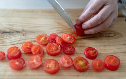 How to cut cherry tomatoes in half all at once