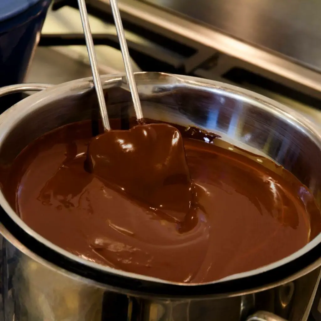 Stir continuously until the chocolate melts completely